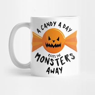 A candy a day keeps the monsters away - Halloween Mug